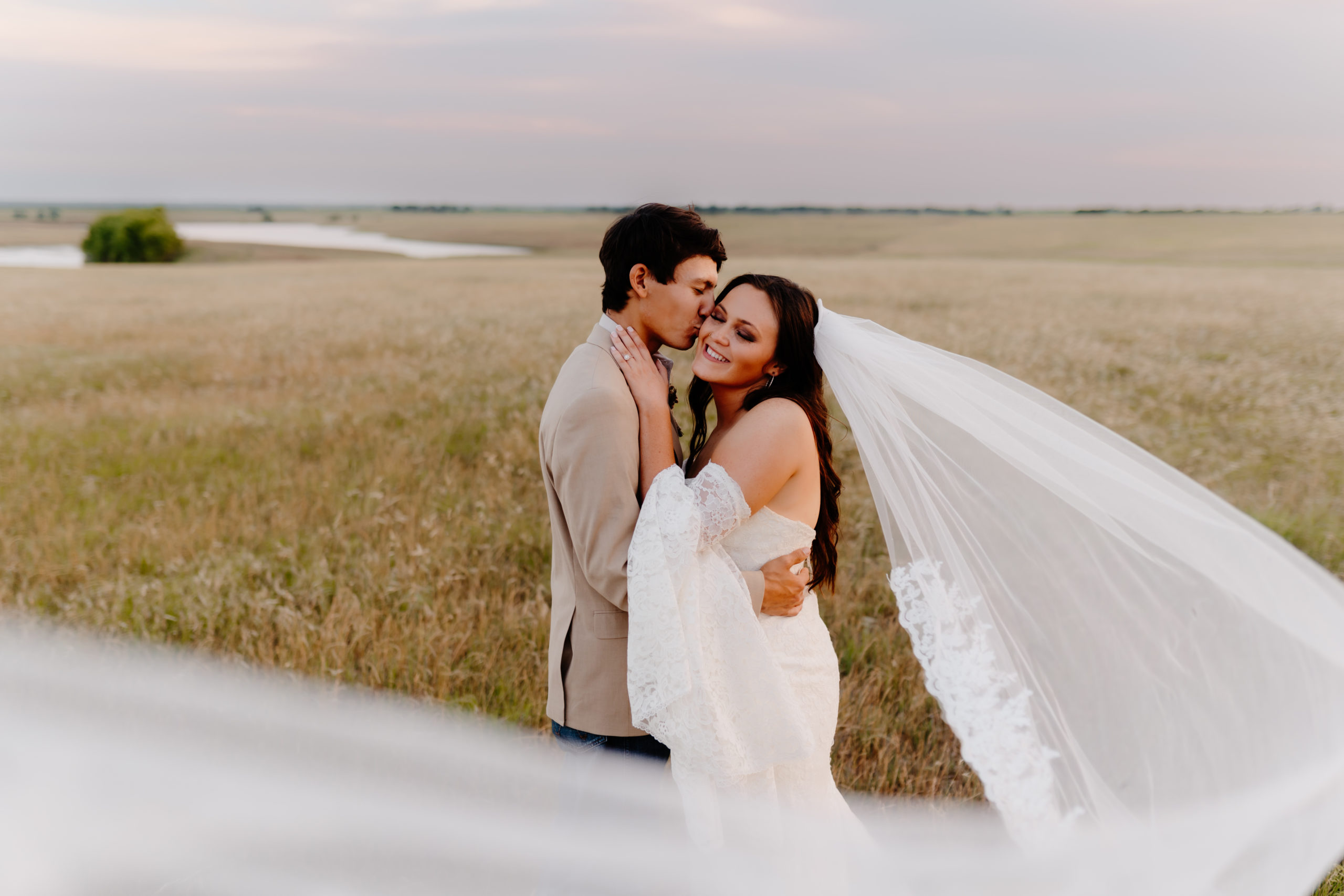 bride and groom kissing